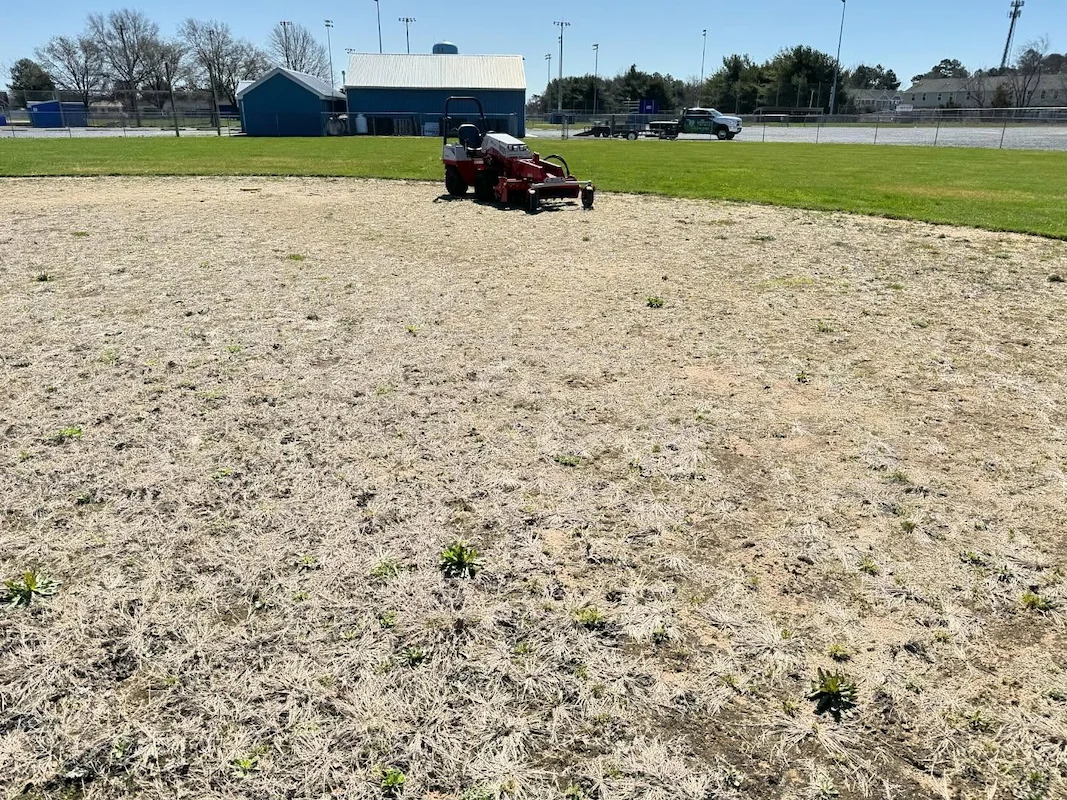 Worn athletic field restored by Harvest Turf Care Sussex County DE