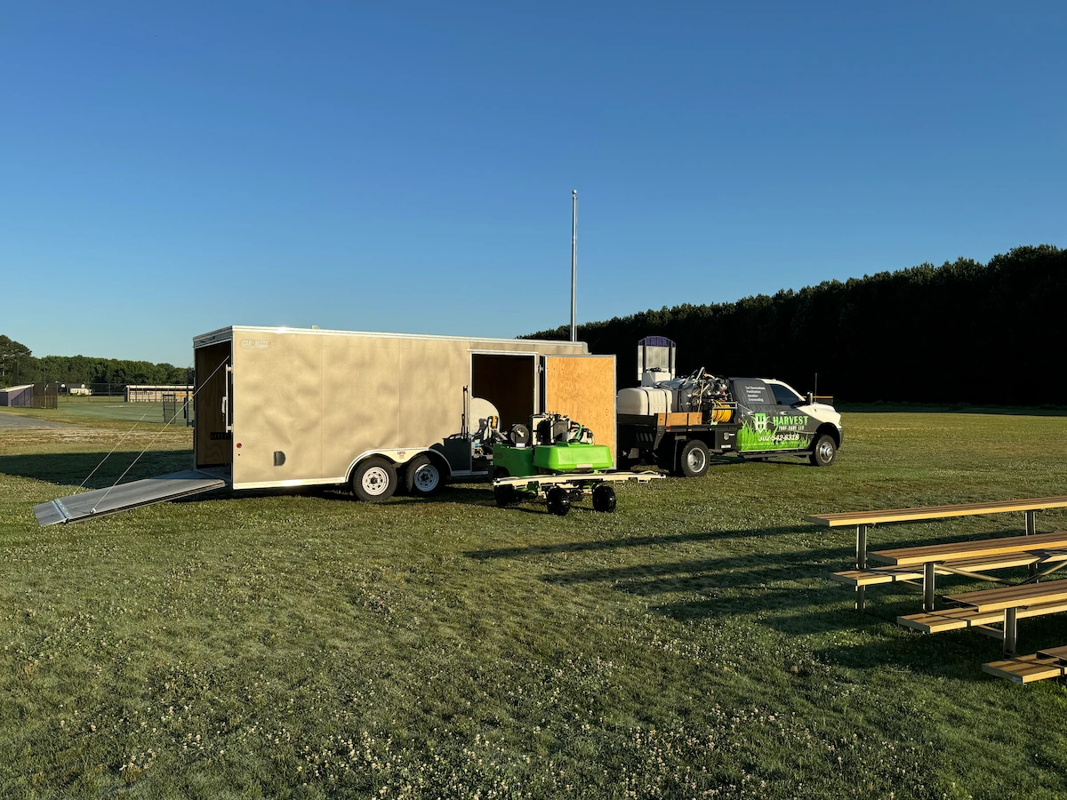 Harvest Turf Care truck and sports turf equipment set up on athletic field for Sports Turf Care in Sussex County DE